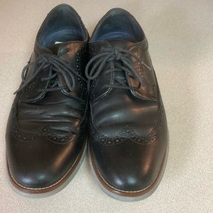 Johnston & Murphy 9.5 dark navy wingtips with British Tan trim on back and soles